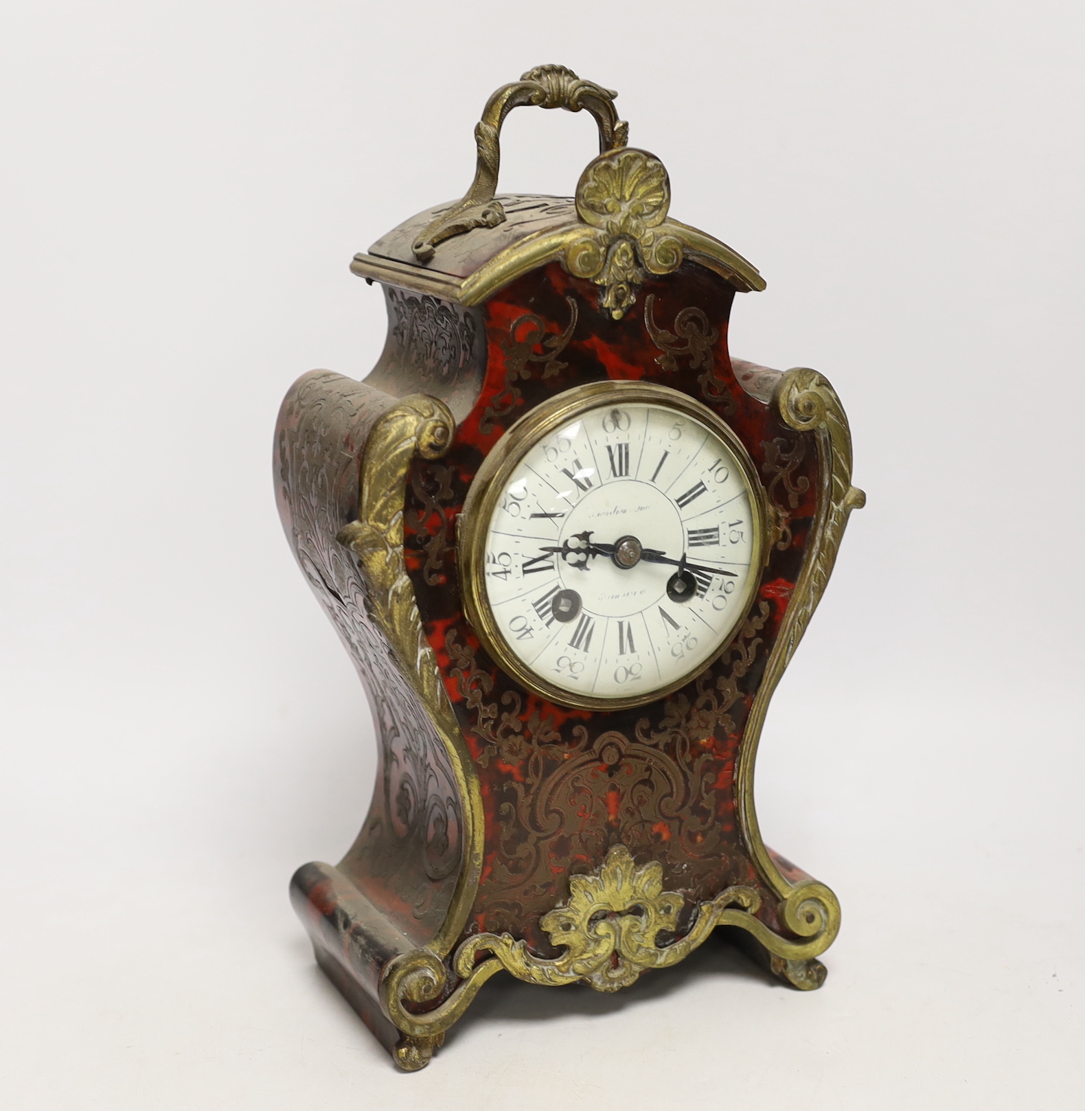A 19th century French boulle cased mantel clock, 30cm